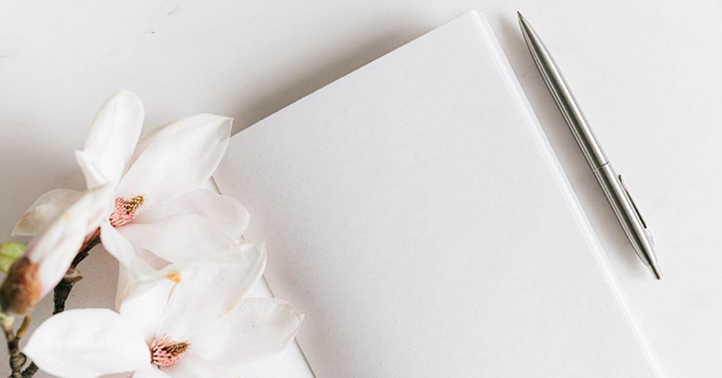 Banner Magnolia Blooms with appointment book and pen